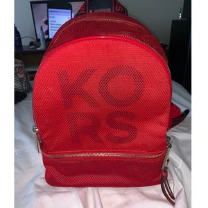 MK red backpack
